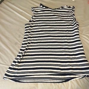 striped shirt worn, button on top in the back, flowy bottom, sleeveless